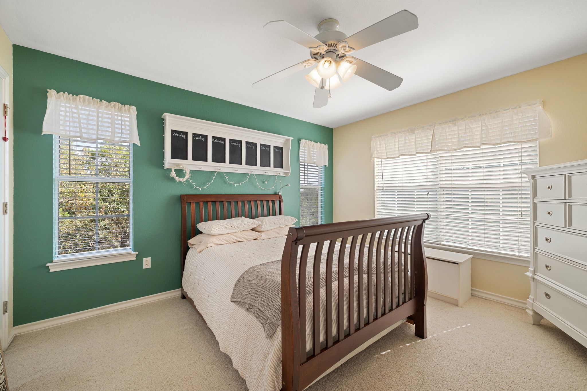 19045 Venture Drive Lago Vista, TX 78645 - Photo 20 of 40 Bedroom featuring ceiling fan and carpet flooring