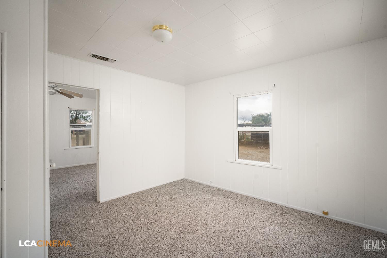Undisclosed Address Taft, CA 93268 - Photo 18 of 28 an empty room with windows