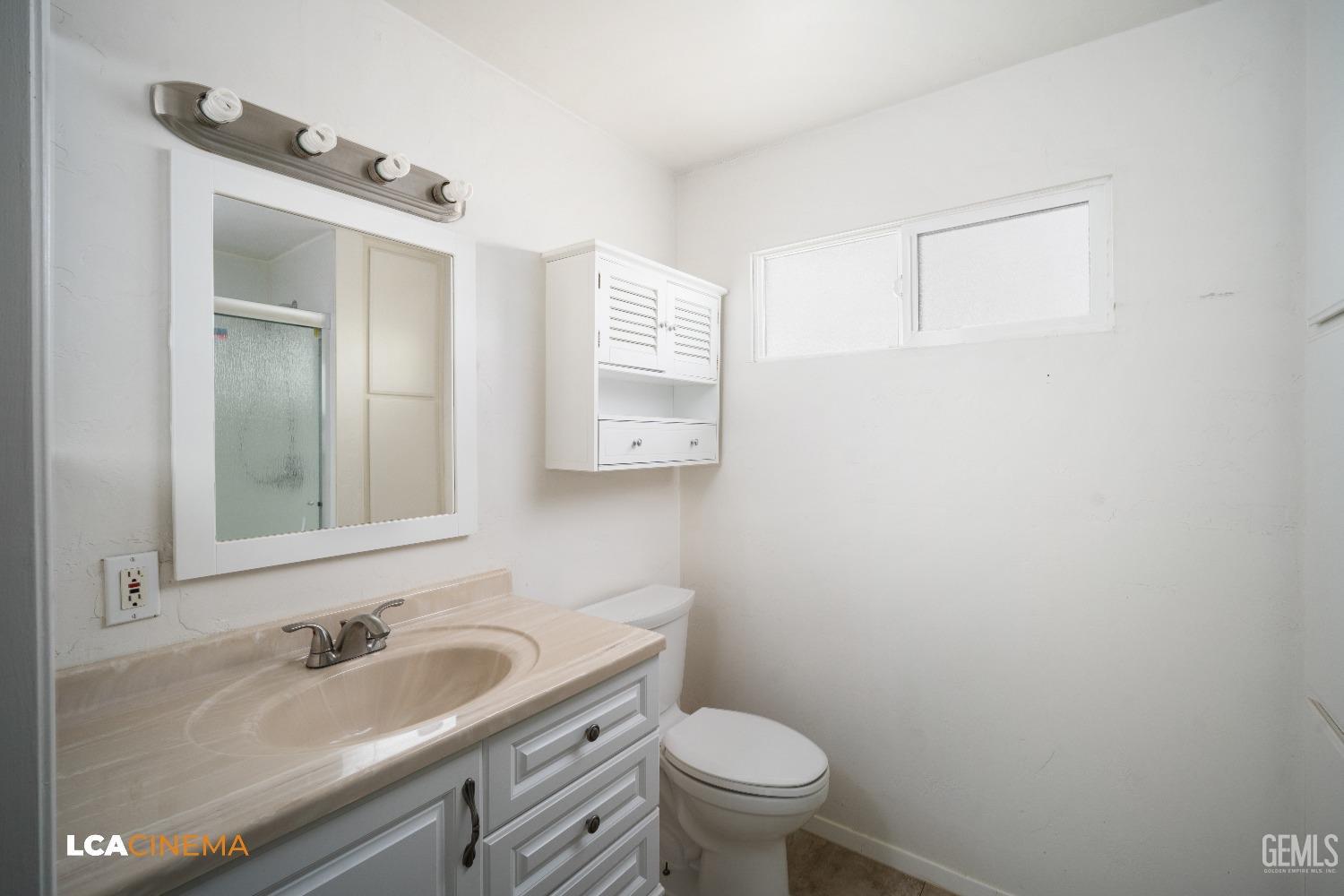 Undisclosed Address Taft, CA 93268 - Photo 19 of 28 a bathroom with a sink and a toilet