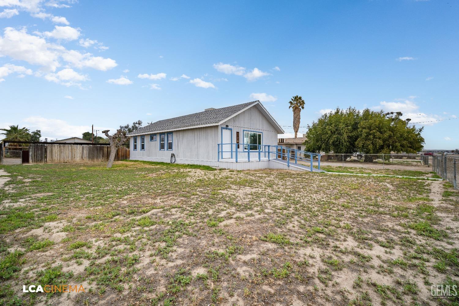 Undisclosed Address Taft, CA 93268 - Photo 4 of 28 a view of a house with a yard
