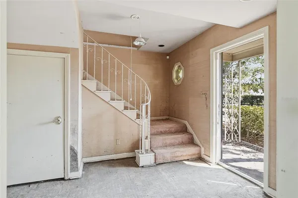 a front view of a building with garden