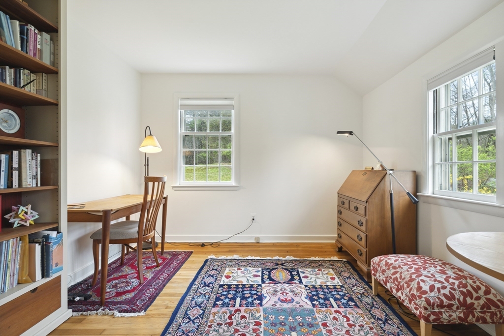 64 Trapelo Road Lincoln, MA 01773 - Photo 16 of 33 a bedroom with furniture and a rug