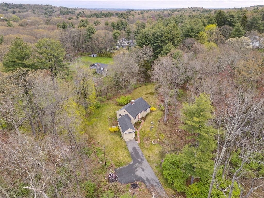 64 Trapelo Road Lincoln, MA 01773 - Photo 3 of 33 an aerial view of residential houses with outdoor space and trees