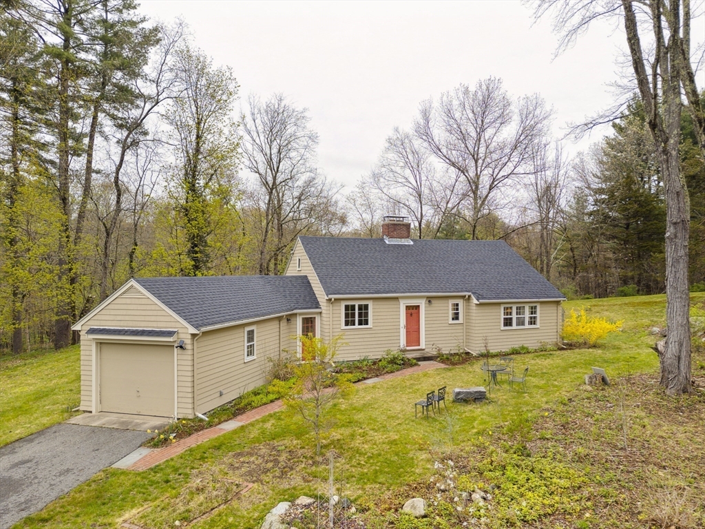 64 Trapelo Road Lincoln, MA 01773 - Photo 33 of 33 a front view of a house with a yard