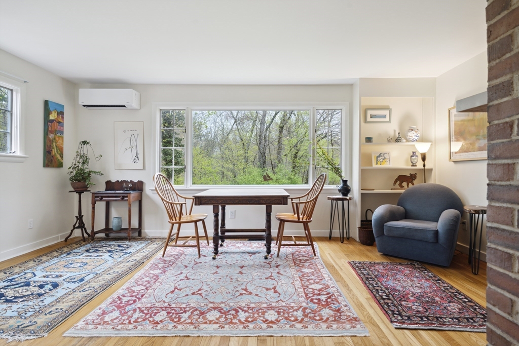 64 Trapelo Road Lincoln, MA 01773 - Photo 5 of 33 a living room with furniture rug and a table