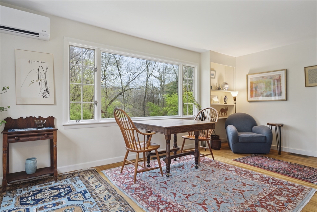 64 Trapelo Road Lincoln, MA 01773 - Photo 7 of 33 a dining room with furniture and wooden floor