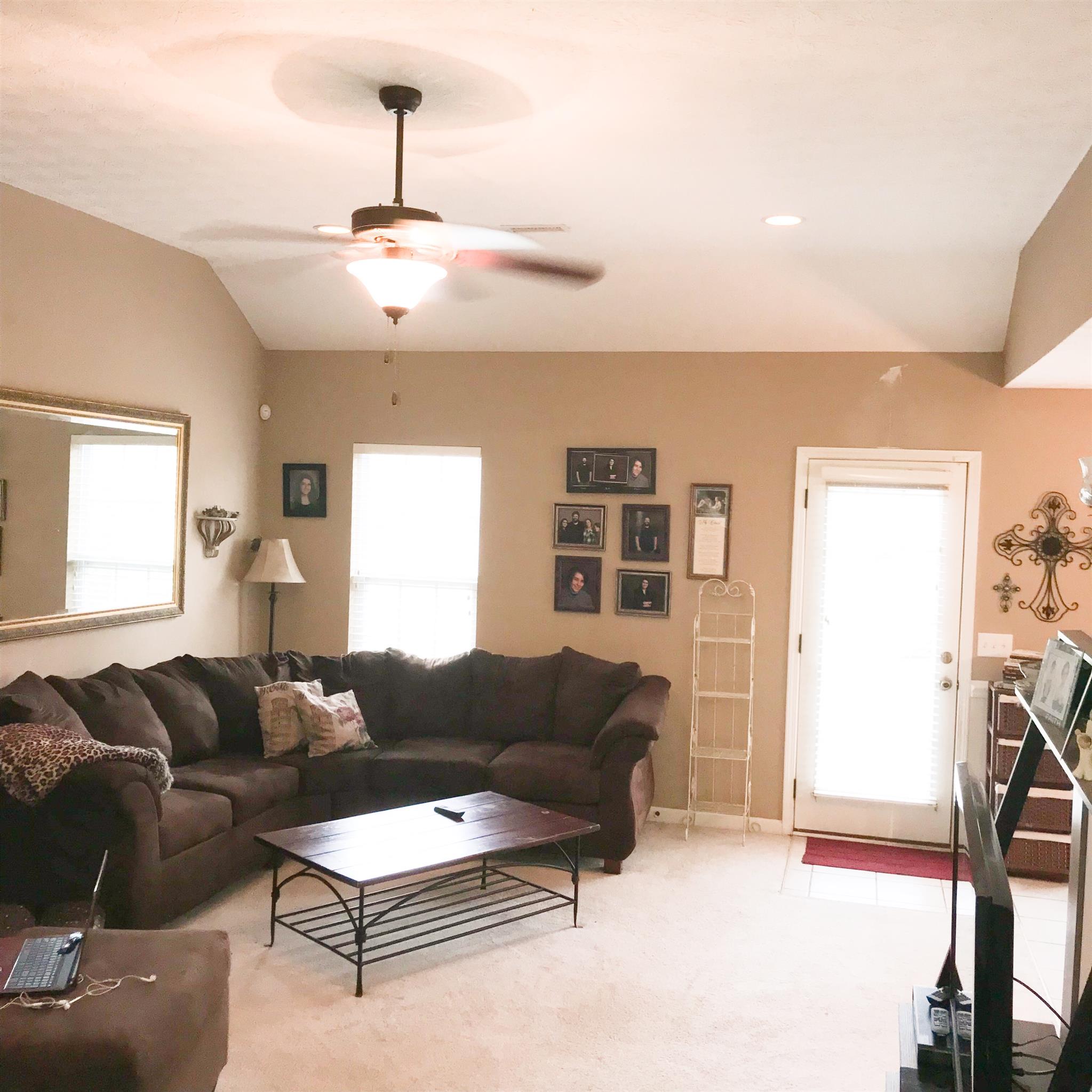 714 Arabian Lane Springfield, TN 37172 - Photo 7 of 25 Living room is open to the kitchen. One step down to your private patio.