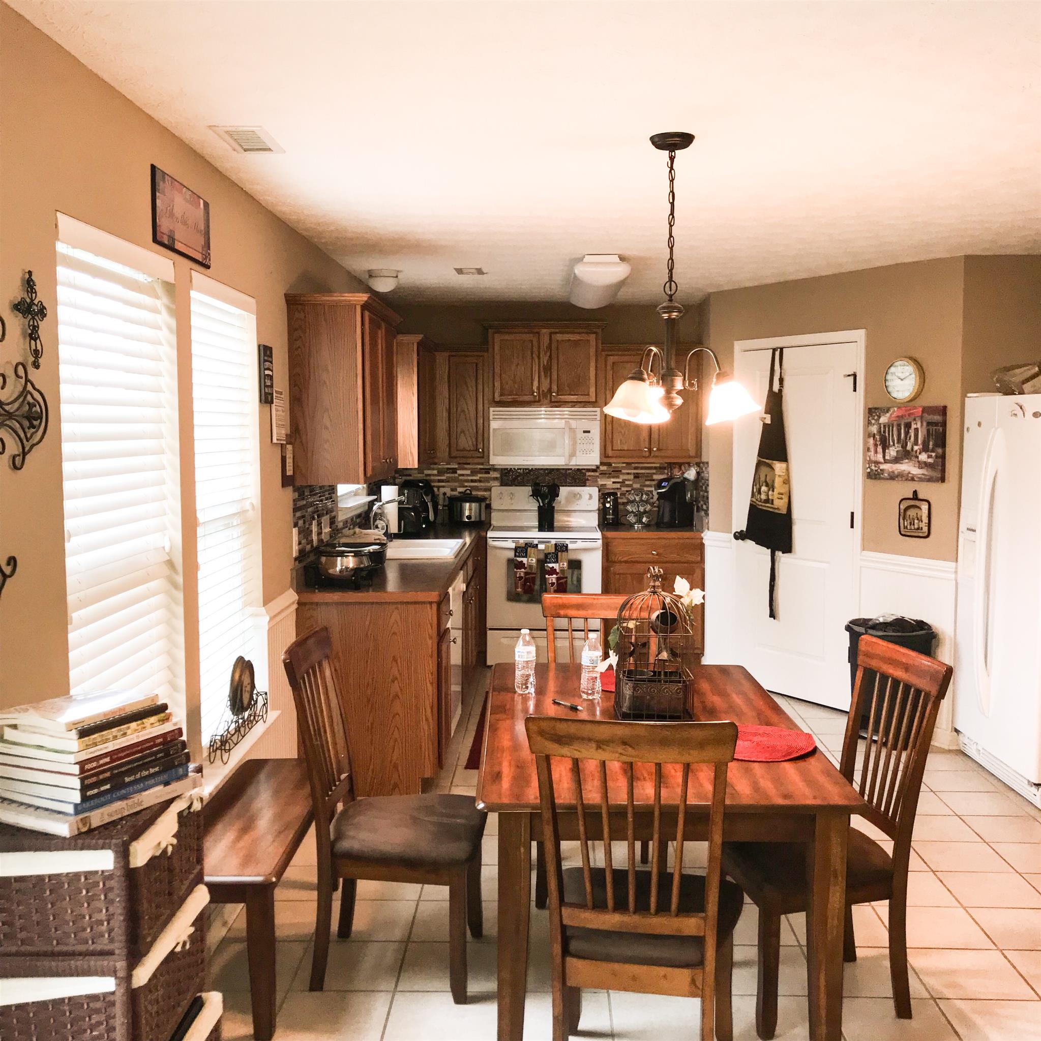 714 Arabian Lane Springfield, TN 37172 - Photo 9 of 25 Dining area of this large kitchen looks out to your back yard with mature trees.