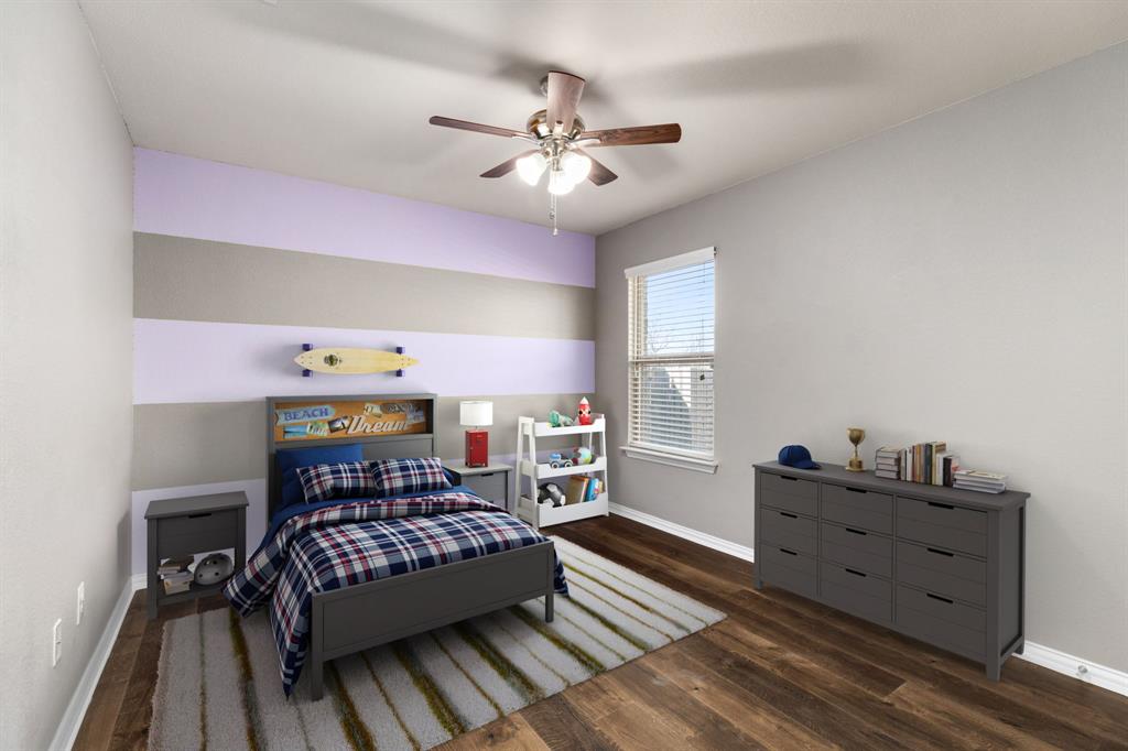 464 Evening Star Kyle, TX 78640 - Photo 7 of 8 Digital Staging. Hardwood flooring and a sun-filled window create an inviting atmosphere in this well-appointed bedroom.