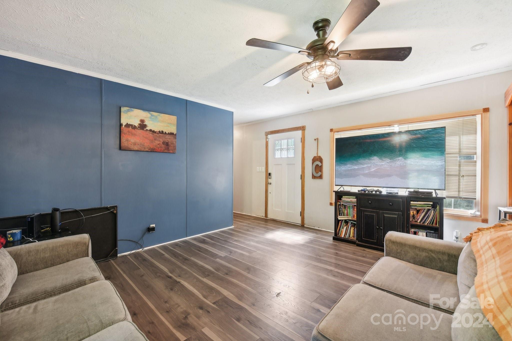 220 Yarbro Road Kings Mountain, NC 28086 - Photo 24 of 38 a living room with furniture and a flat screen tv