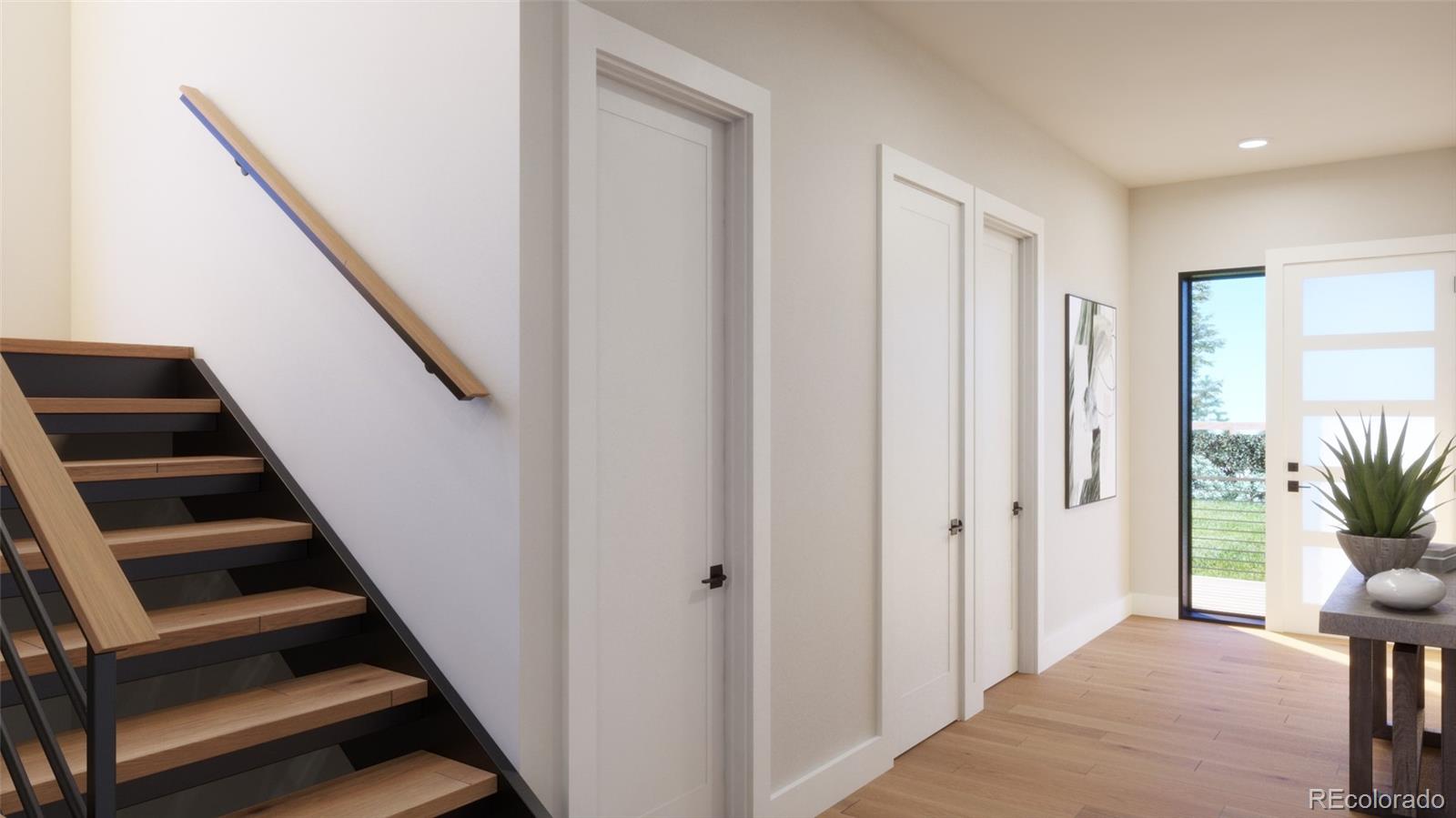 1040 Locust Avenue Boulder, CO 80304 - Photo 13 of 27 a view of entryway and hall with wooden floor