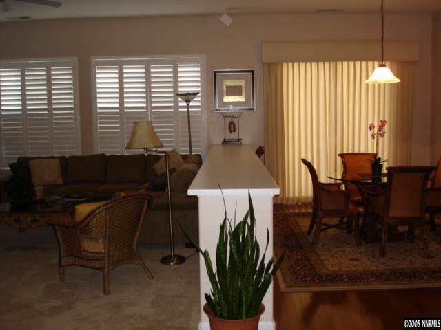 1698 Greycrest Way Reno, NV 89521 - Photo 4 of 6 a dining room with furniture and a window