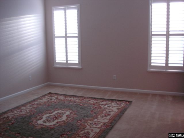 1698 Greycrest Way Reno, NV 89521 - Photo 5 of 6 an empty room with a window