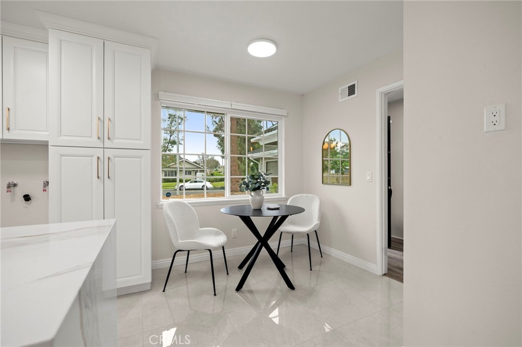 12817 Meadow Green Road La Mirada, CA 90638 - Photo 15 of 43 a view of a livingroom with furniture and window