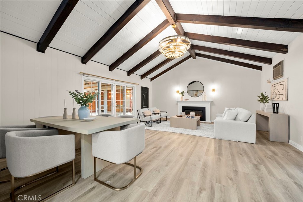 12817 Meadow Green Road La Mirada, CA 90638 - Photo 16 of 43 a living room with furniture and a fireplace