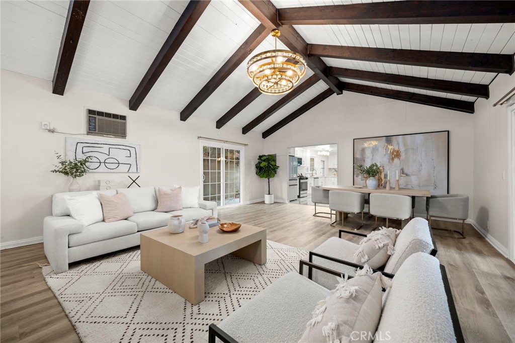 12817 Meadow Green Road La Mirada, CA 90638 - Photo 17 of 43 a living room with furniture and a large window