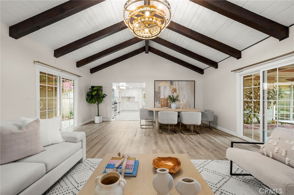 12817 Meadow Green Road La Mirada, CA 90638 - Photo 18 of 43 a living room with furniture and a large window