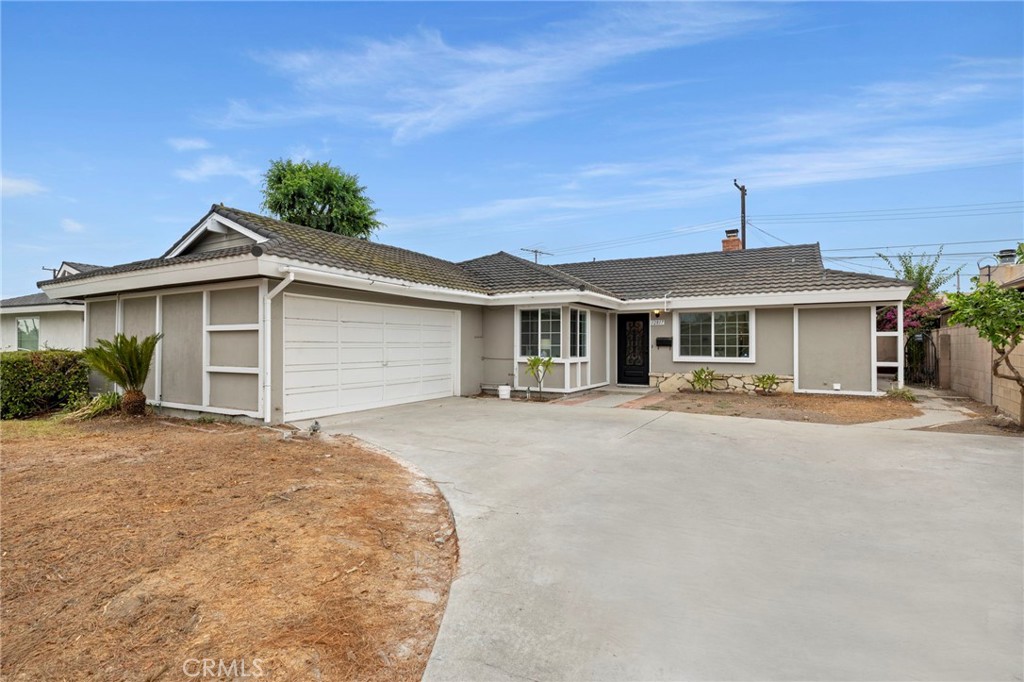 12817 Meadow Green Road La Mirada, CA 90638 - Photo 2 of 43 front view of a house with a outdoor space