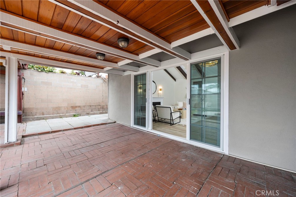 12817 Meadow Green Road La Mirada, CA 90638 - Photo 35 of 43 a view of empty room with wooden floor and fan
