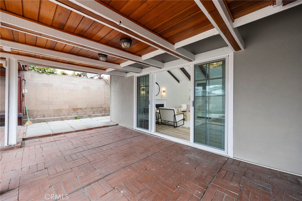 12817 Meadow Green Road La Mirada, CA 90638 - Photo 36 of 43 a view of empty room with wooden floor and fan
