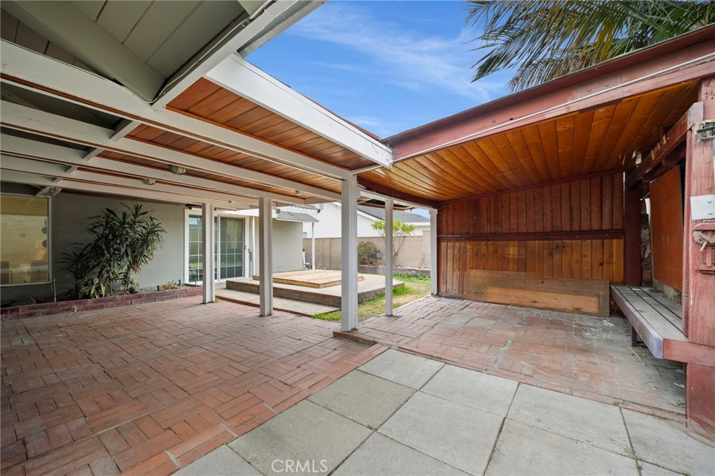 12817 Meadow Green Road La Mirada, CA 90638 - Photo 38 of 43 a view of a room with table and chairs