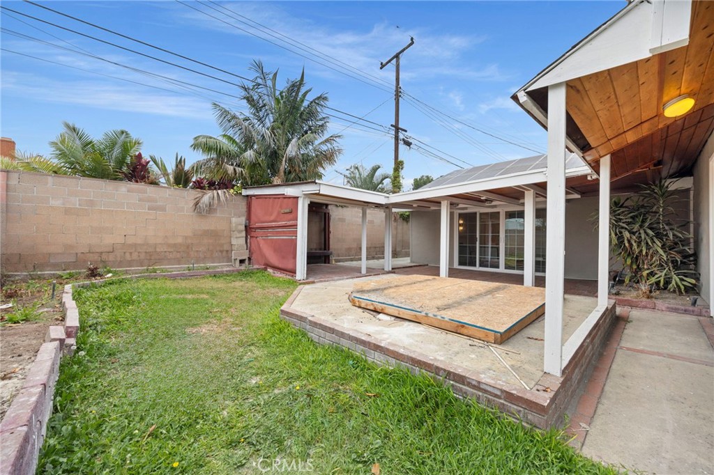 12817 Meadow Green Road La Mirada, CA 90638 - Photo 40 of 43 a front view of a house with garden