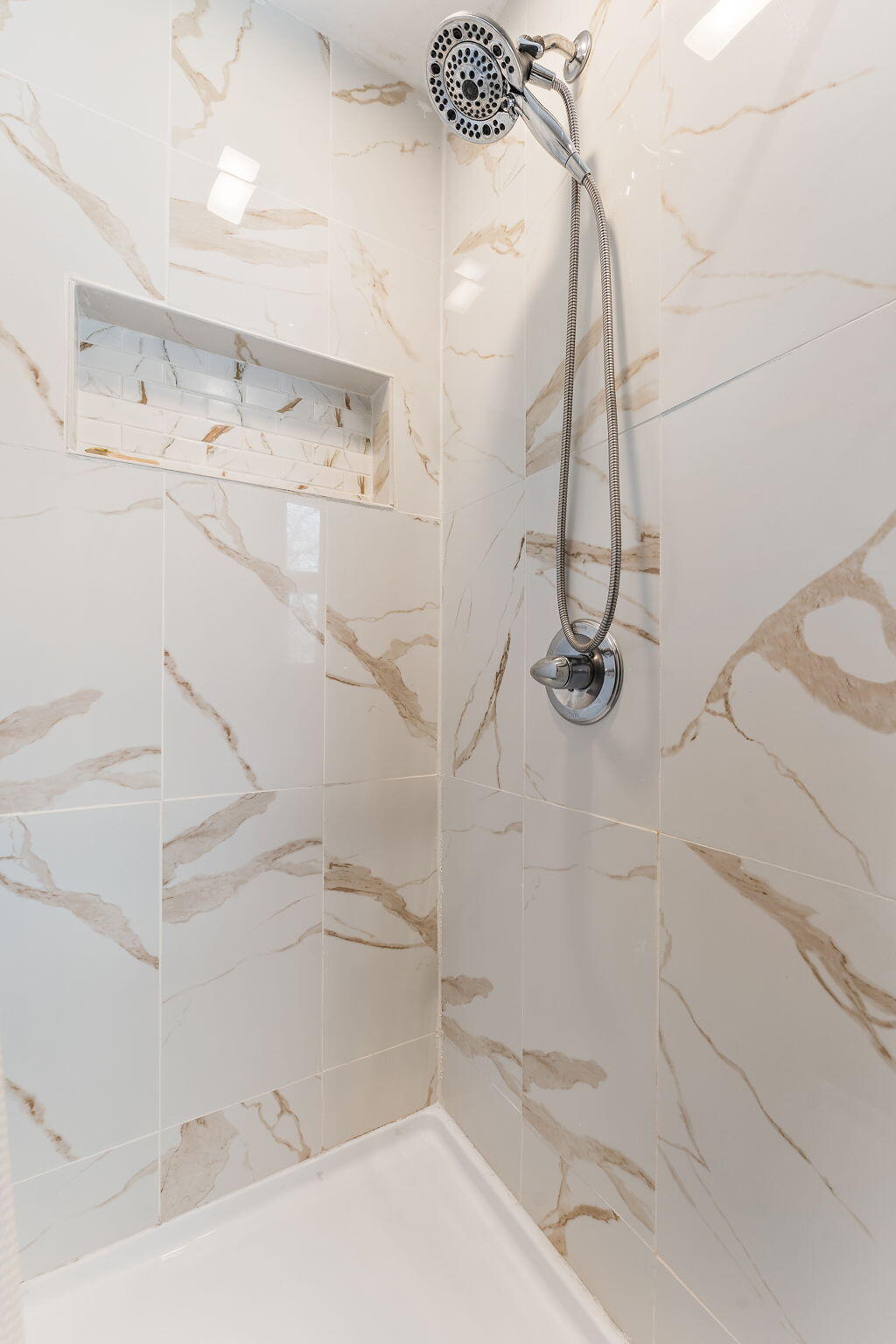 3910 West 106th Lane Crown Point, IN 46307 - Photo 18 of 31 a bathroom with a shower