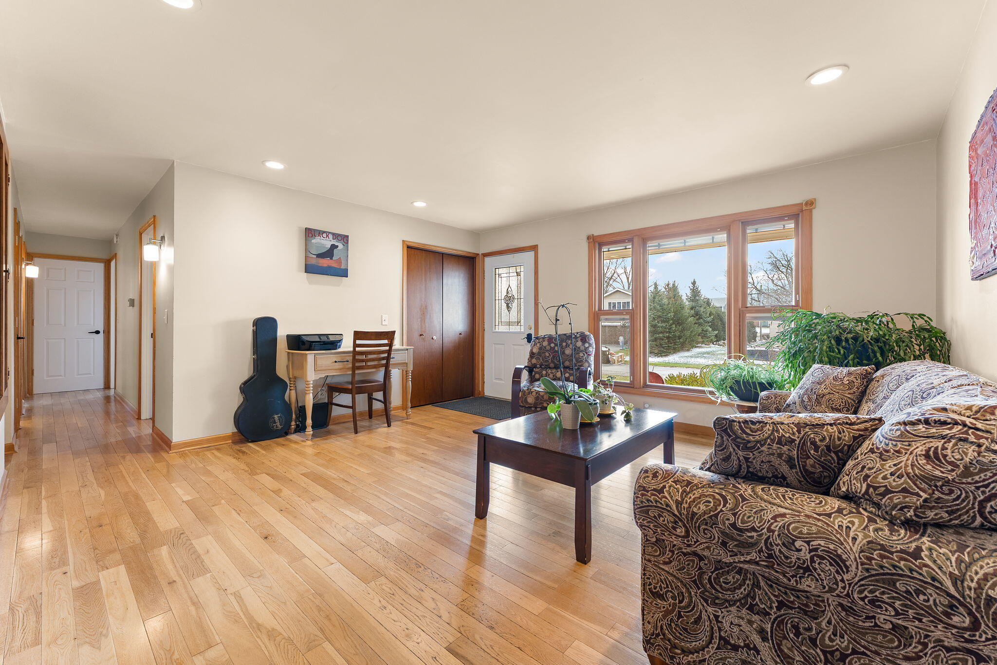3910 West 106th Lane Crown Point, IN 46307 - Photo 5 of 31 a living room with furniture and a large window