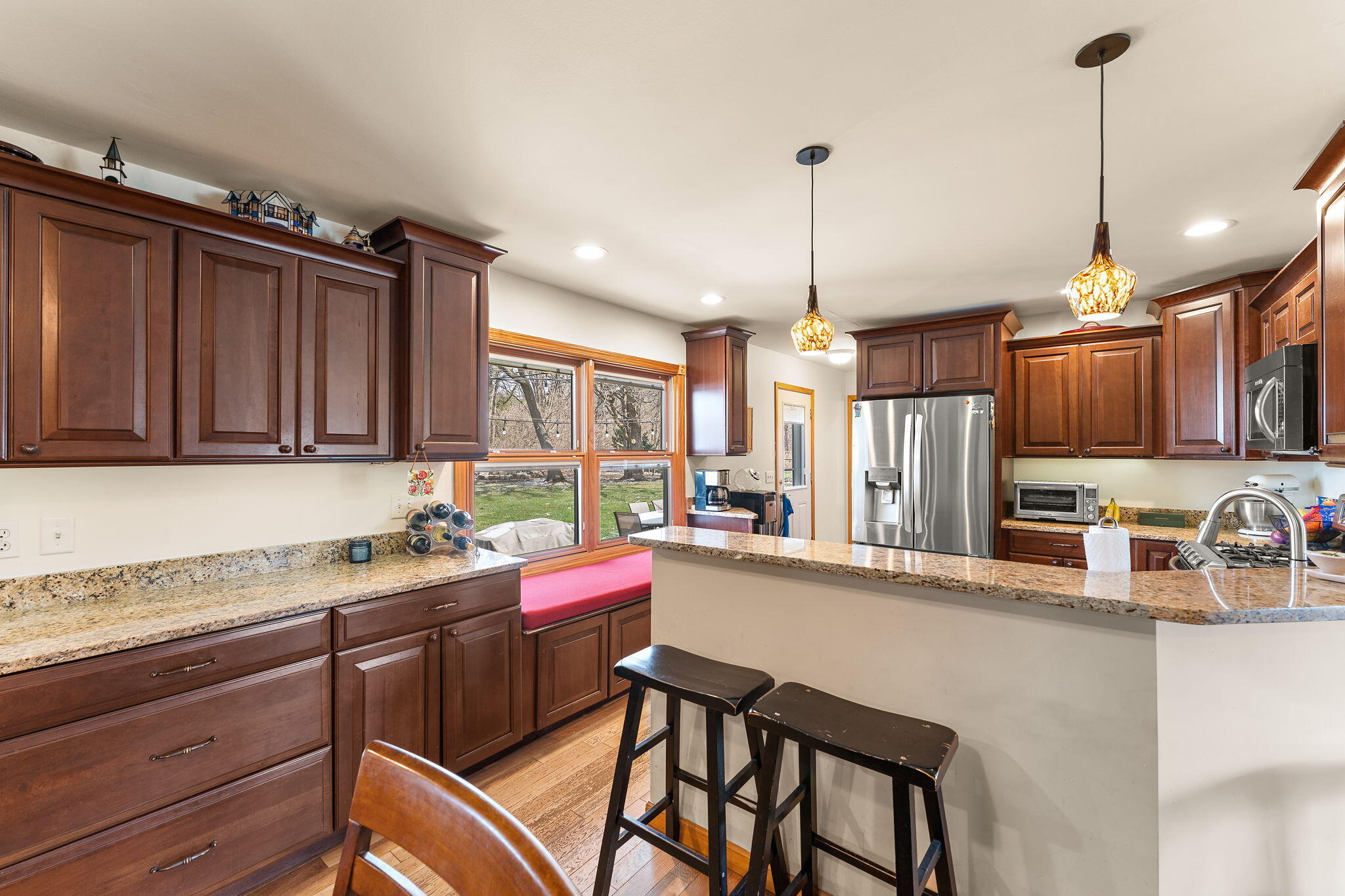3910 West 106th Lane Crown Point, IN 46307 - Photo 7 of 31 a kitchen that has a cabinets counter space and a sink