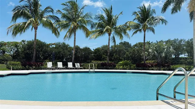 a view of a house with a swimming pool