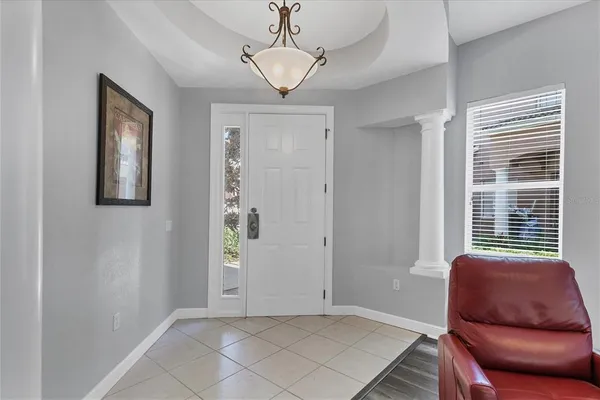 a view of a livingroom with furniture and windows