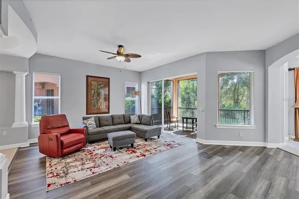a living room with furniture and a window