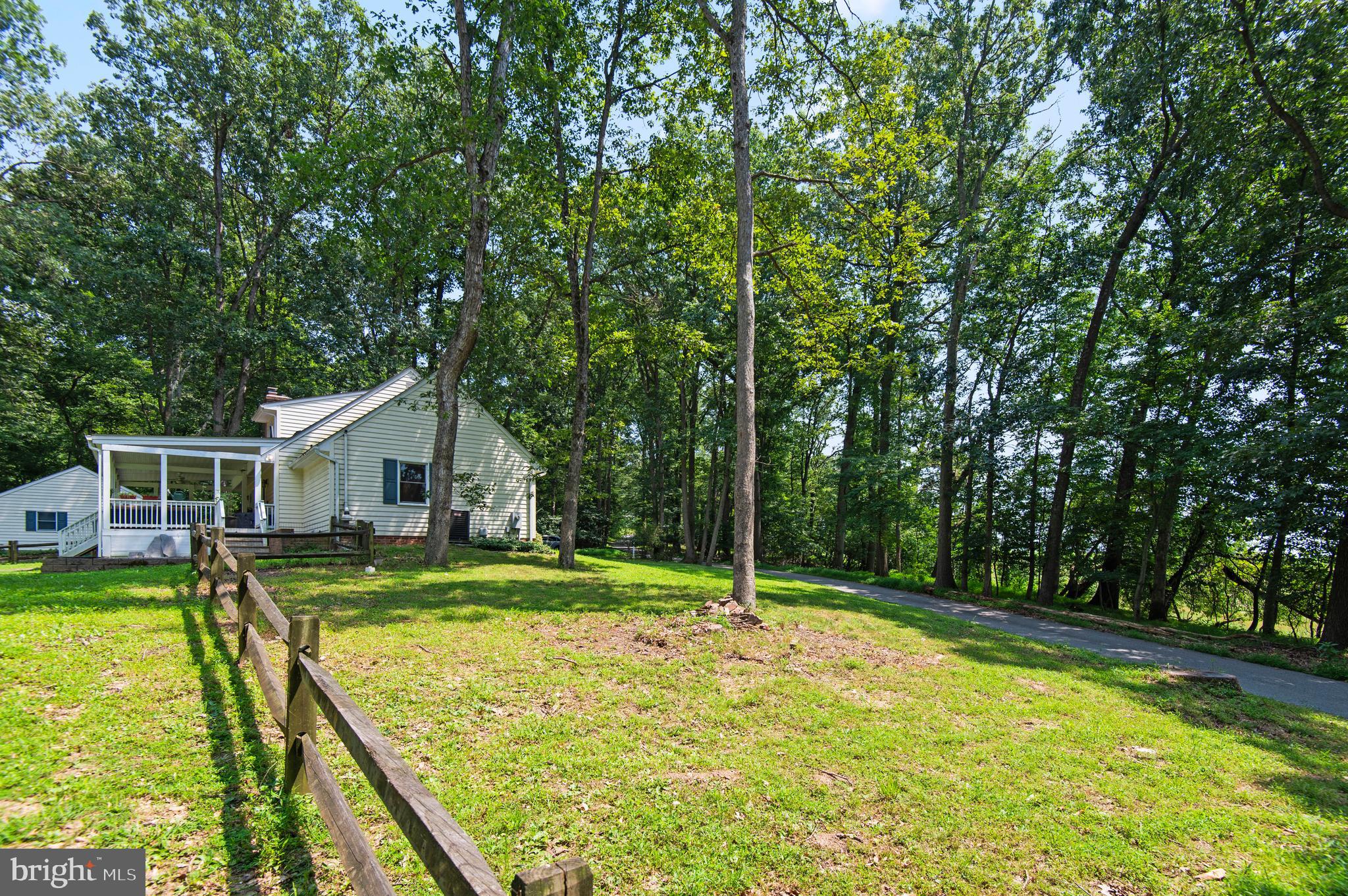 20000 Cameron Mill Road Parkton, MD 21120 - Photo 46 of 57 a view of a house with pool and chairs