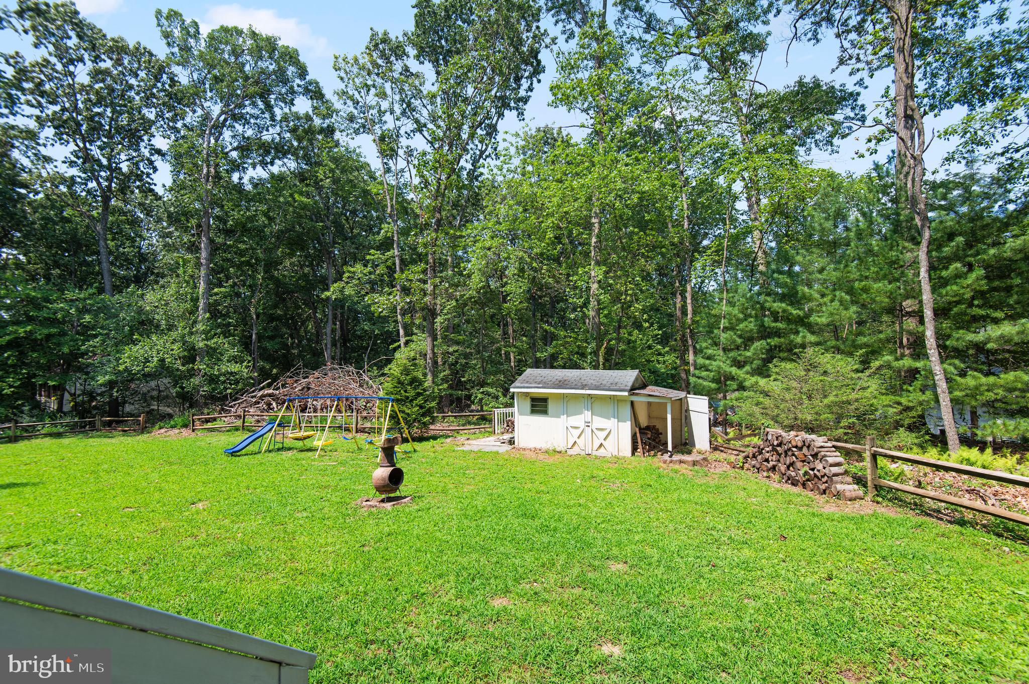 20000 Cameron Mill Road Parkton, MD 21120 - Photo 48 of 57 a view of a backyard with a garden and entertaining space