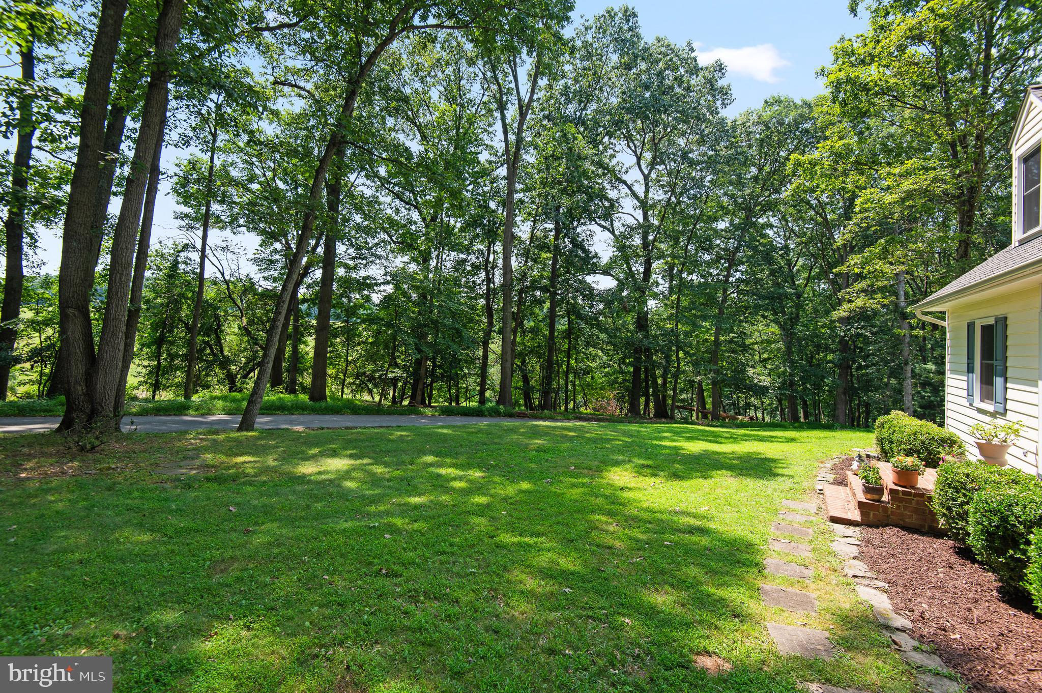 20000 Cameron Mill Road Parkton, MD 21120 - Photo 52 of 57 a big yard with trees in front of it