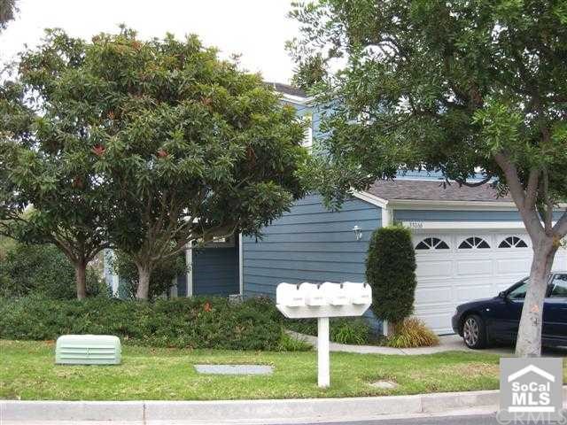 This Cape Cod style end unit is located within a private gated community and just minutes to sandy beaches and the Dana Point Harbor