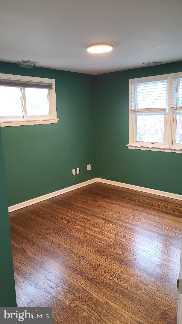 960 Dale Road Secane, PA 19018 - Photo 19 of 23 a view of a room with wooden floor and windows
