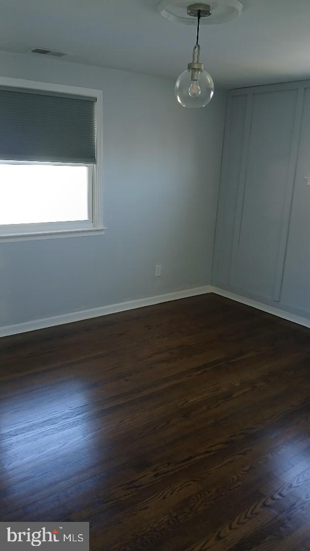 960 Dale Road Secane, PA 19018 - Photo 2 of 23 a view of a room with wooden floor and a window