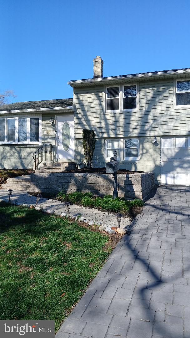 960 Dale Road Secane, PA 19018 - Photo 5 of 23 a front view of a house with a yard