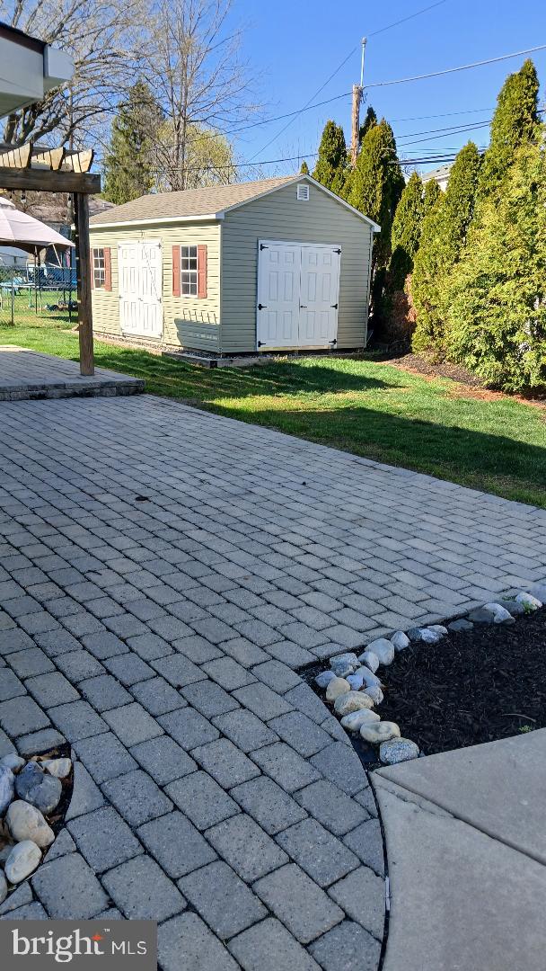 960 Dale Road Secane, PA 19018 - Photo 8 of 23 a front view of a house with a yard and a garage