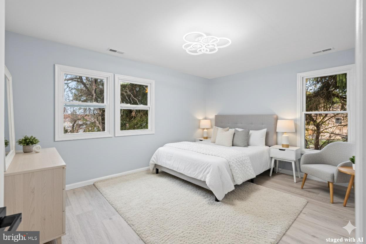 11046 Ferndale Street Philadelphia, PA 19116 - Photo 15 of 37 a bedroom with a large bed and a window