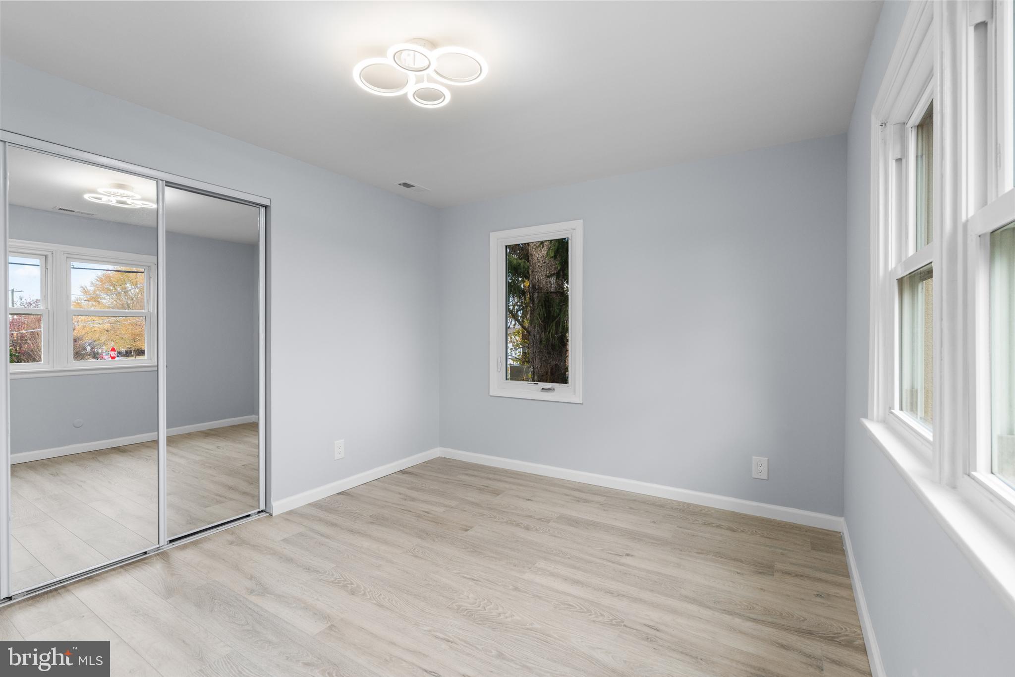 11046 Ferndale Street Philadelphia, PA 19116 - Photo 18 of 37 wooden floor in an empty room with a window