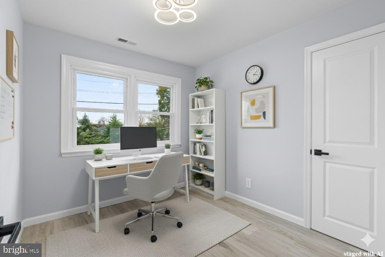 11046 Ferndale Street Philadelphia, PA 19116 - Photo 21 of 37 a view of a workspace with furniture and a window