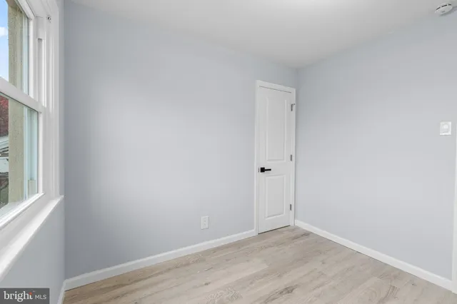 a bathroom with a toilet sink and shower