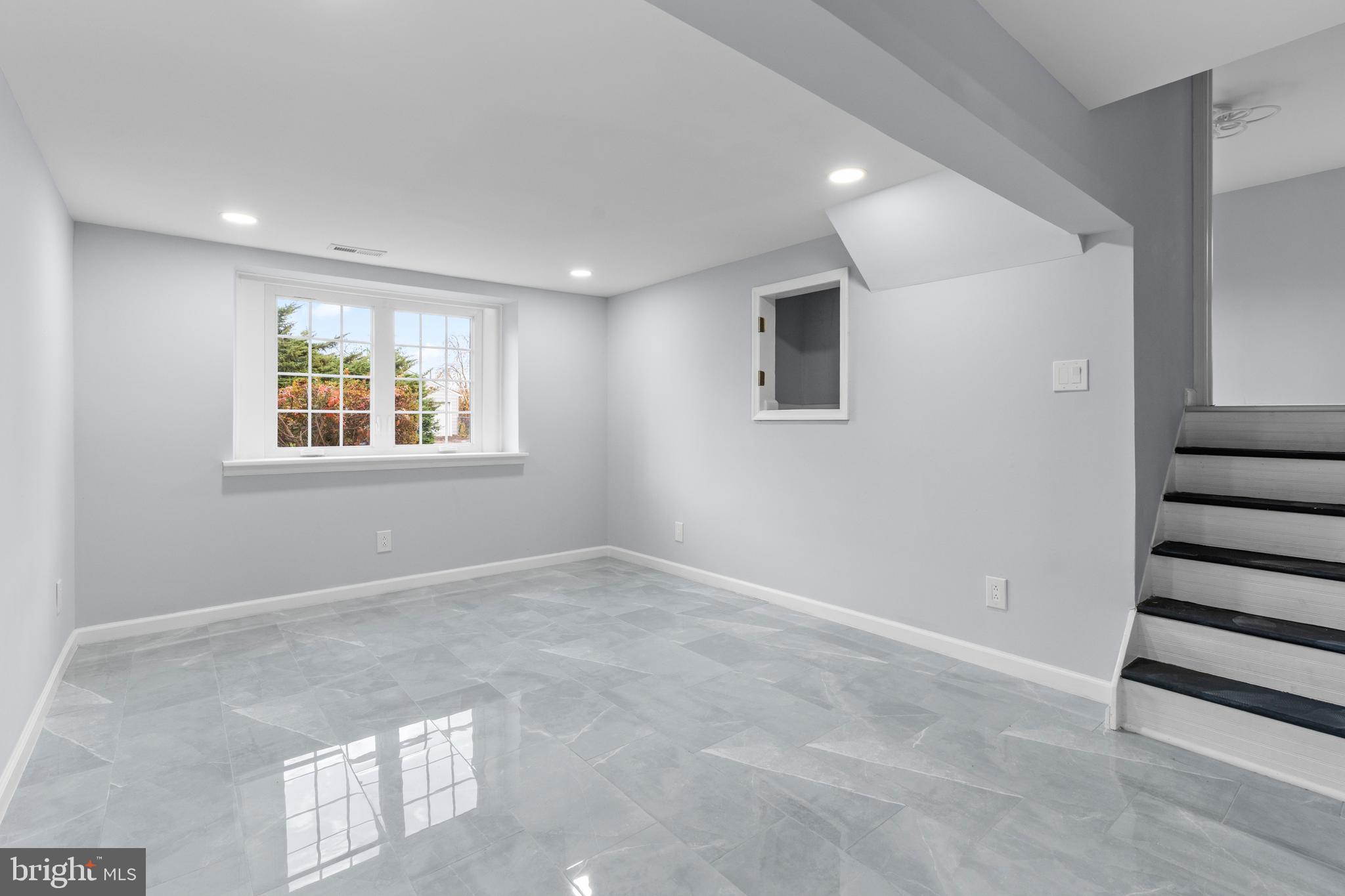 11046 Ferndale Street Philadelphia, PA 19116 - Photo 25 of 37 a view of an empty room with a window