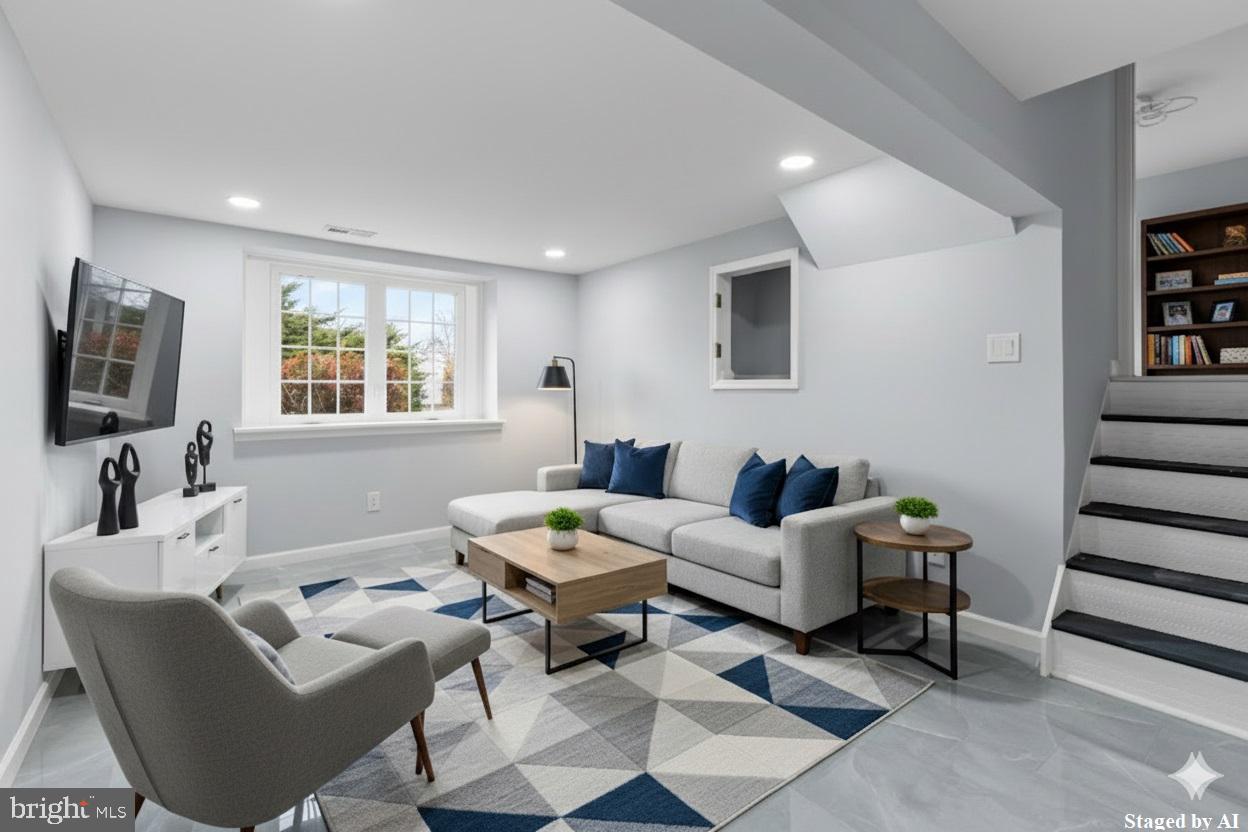 11046 Ferndale Street Philadelphia, PA 19116 - Photo 26 of 37 a living room with furniture and a flat screen tv