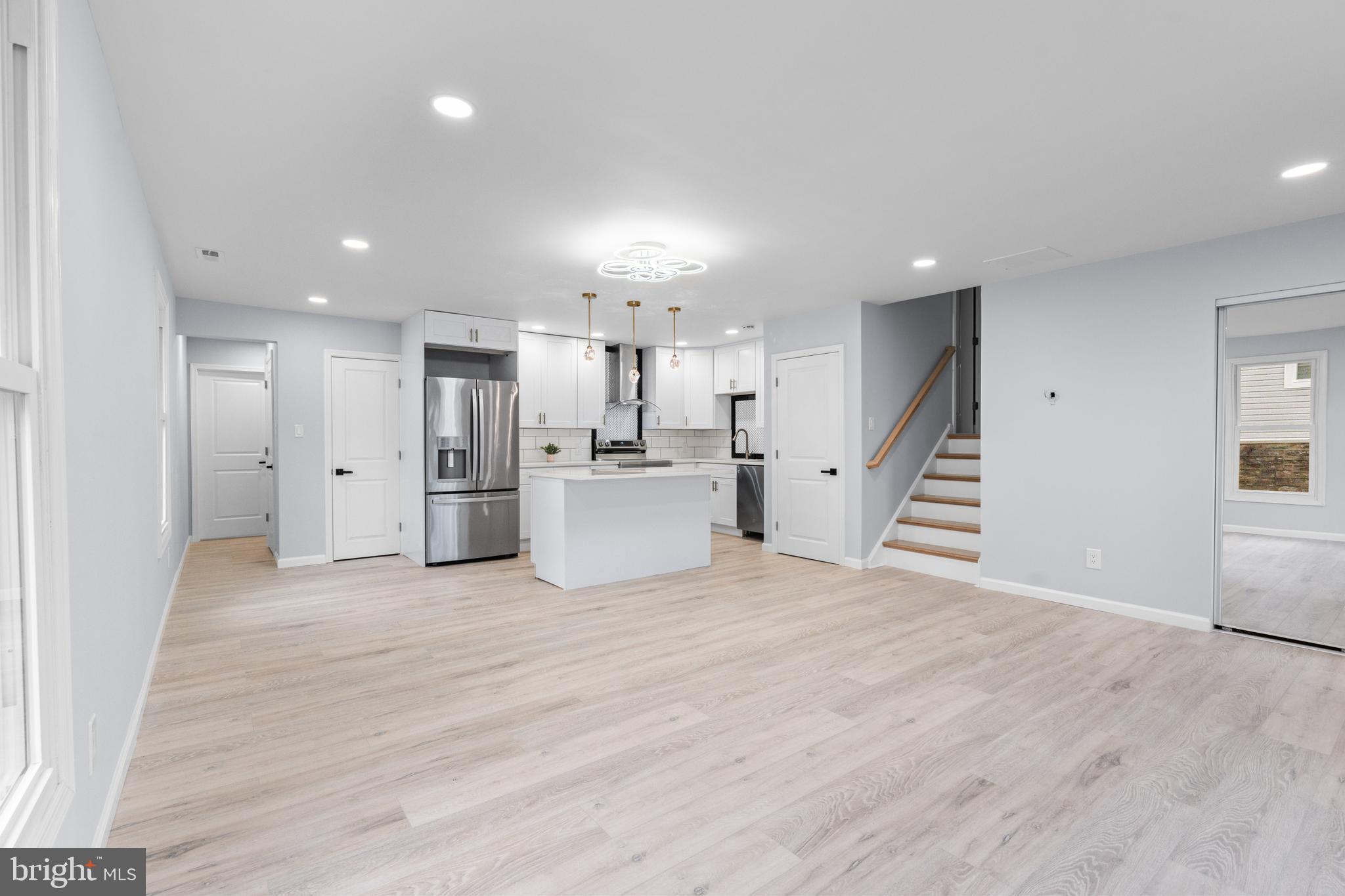 11046 Ferndale Street Philadelphia, PA 19116 - Photo 3 of 37 a view of a kitchen with a sink and a refrigerator