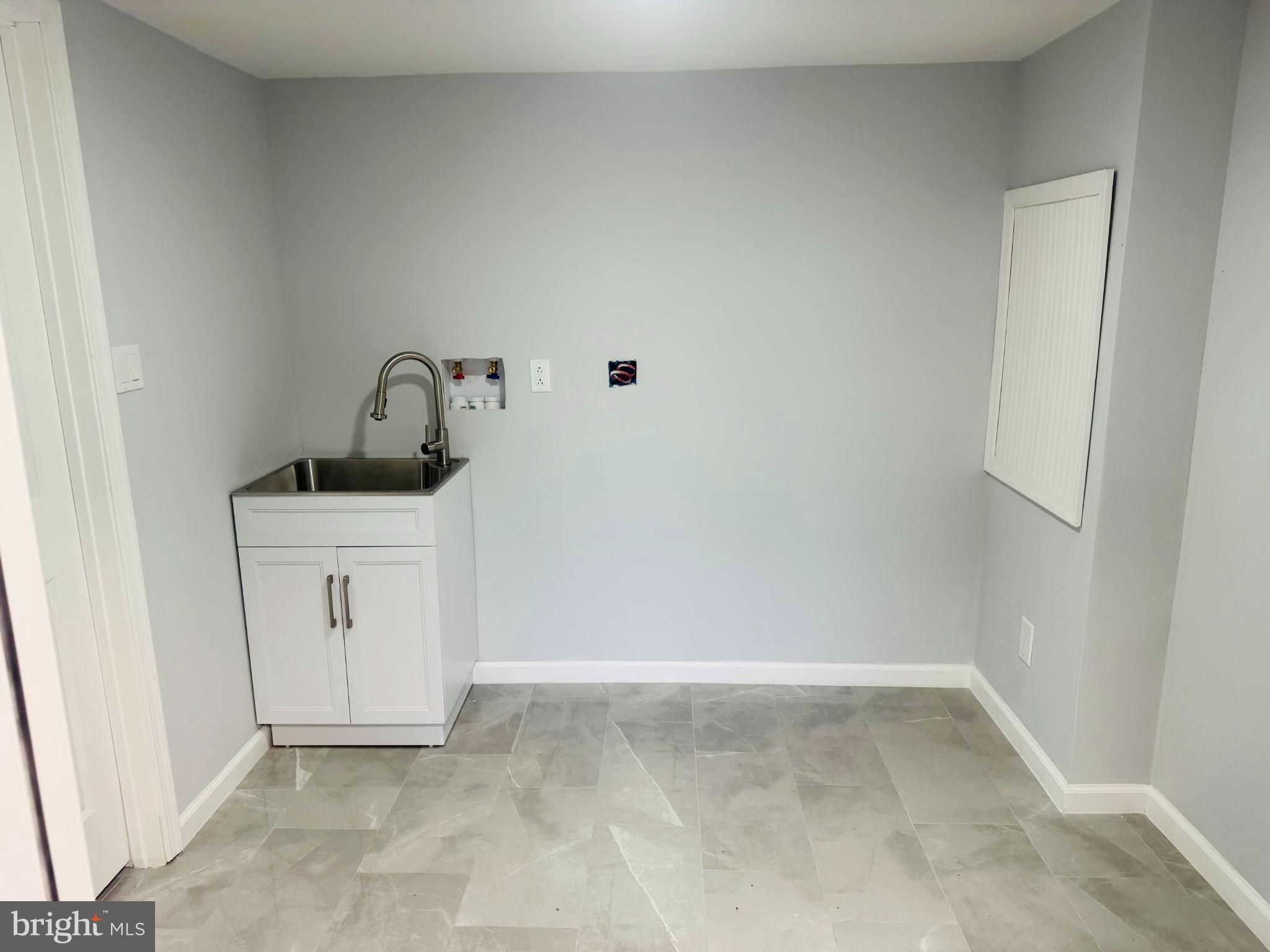 11046 Ferndale Street Philadelphia, PA 19116 - Photo 35 of 37 a bathroom with a sink
