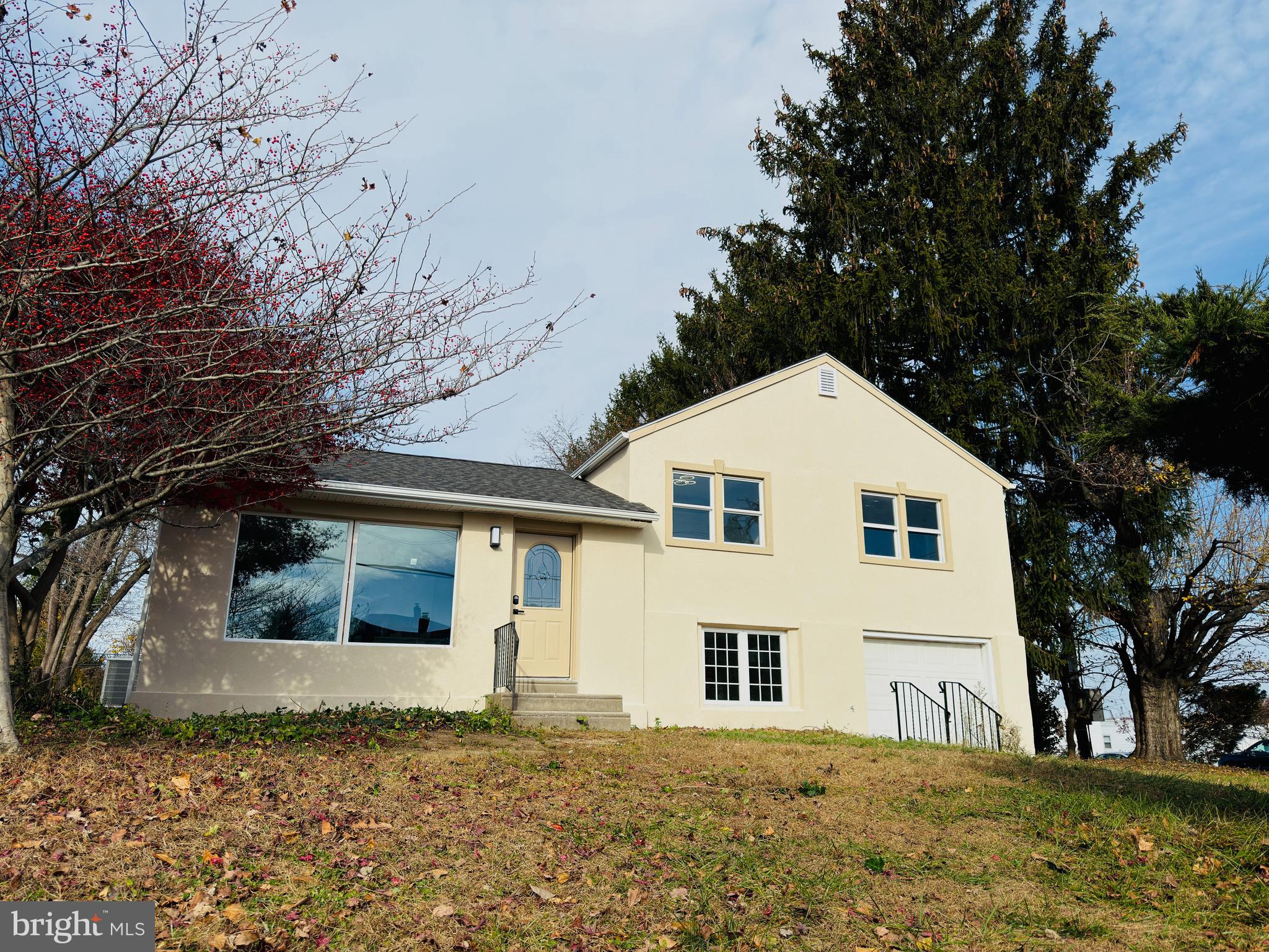 11046 Ferndale Street Philadelphia, PA 19116 - Photo 36 of 37 a front view of a house with a yard