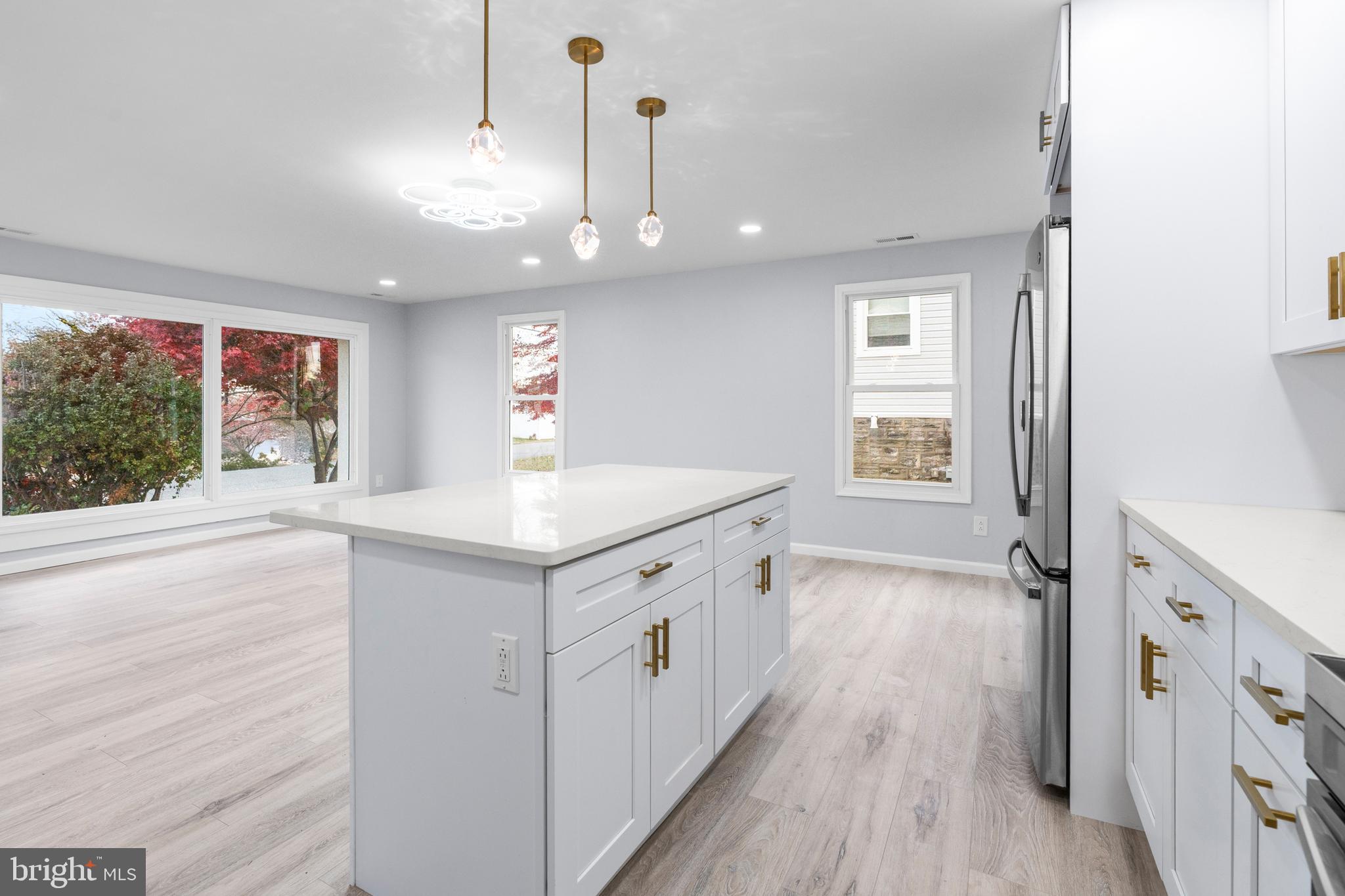 11046 Ferndale Street Philadelphia, PA 19116 - Photo 8 of 37 a bathroom with a sink a vanity and a large mirror